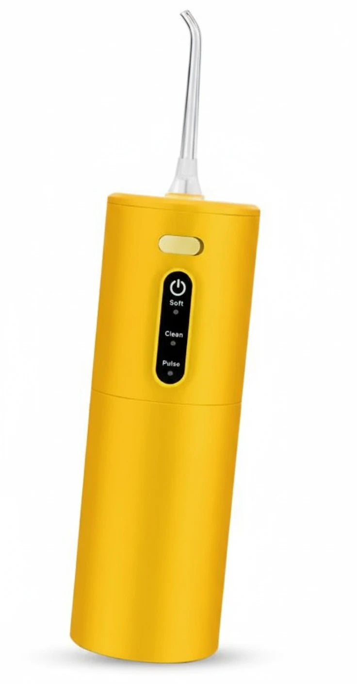 Yellow dental water flosser on a white background