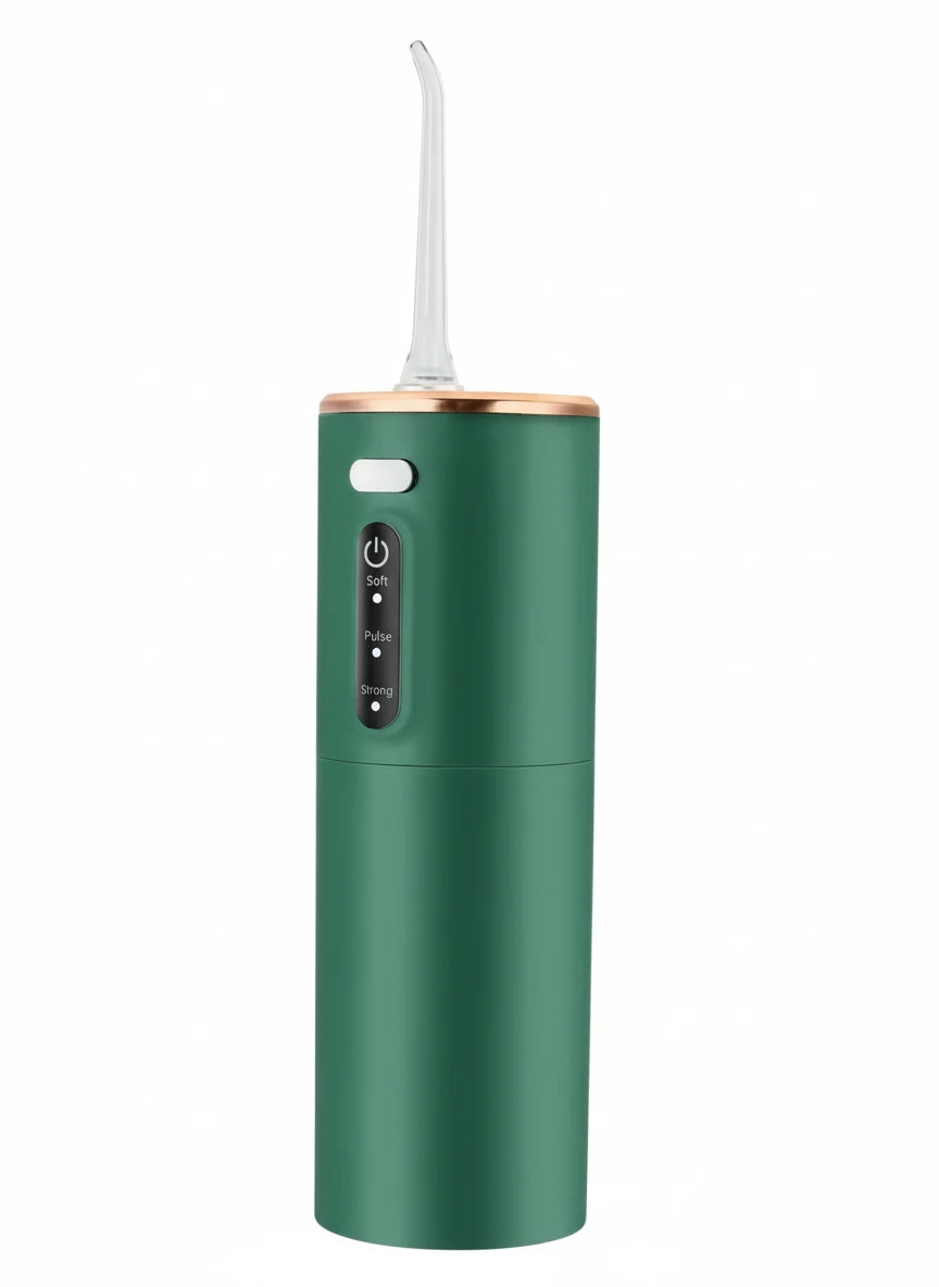 Green dental water flosser on a white background