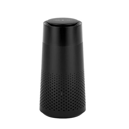 Black cylindrical device with perforated design on a white background